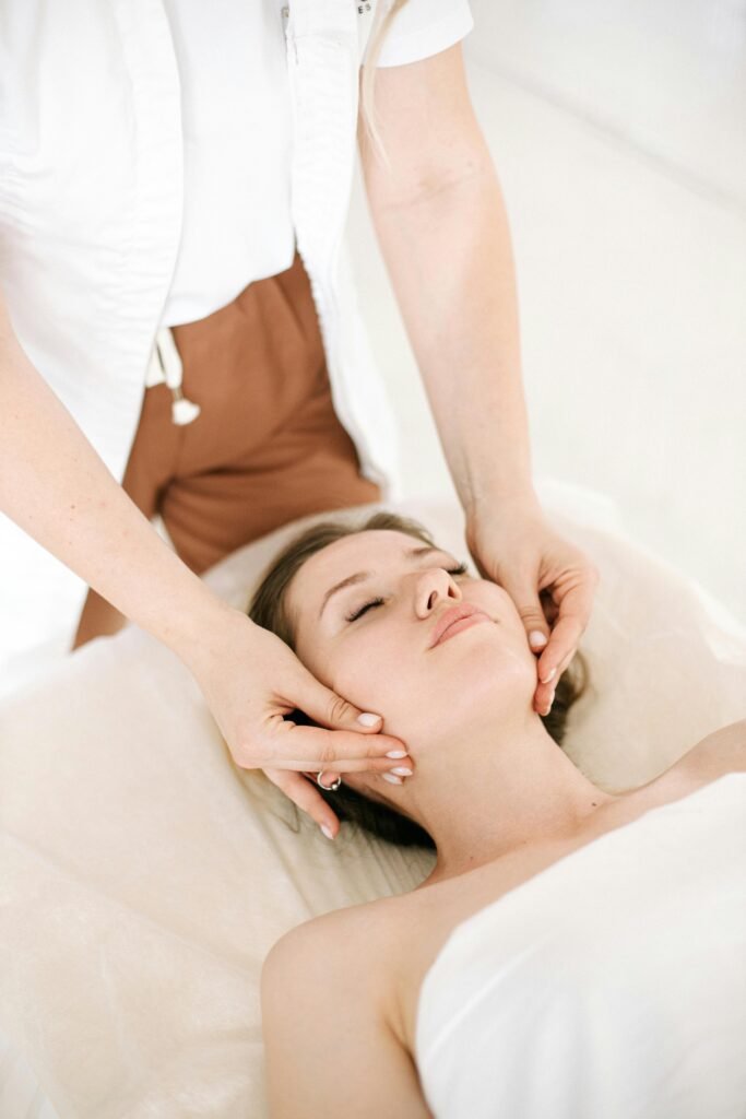A soothing facial massage therapy session promoting relaxation and wellness.